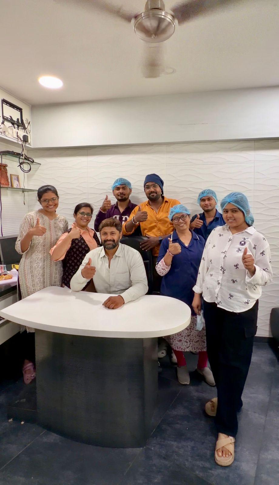 Our full clinical team The full Dr. Varun's Dental Clinic team celebrating together in Ahmedabad